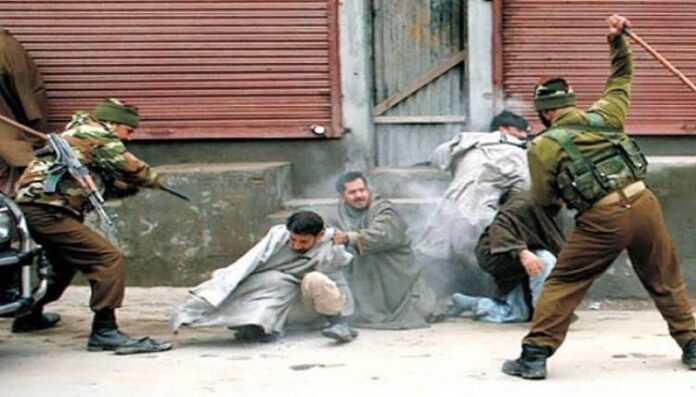 Indian Army beating Muslims in IOK