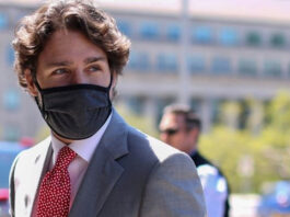 PM Trudeau Puts On Mask, Canadians Urged to do Same PM Trudeau