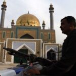Sehwan police officers were suspended for letting people into the shrine Sehwan police officers were suspended for letting people into the shrine