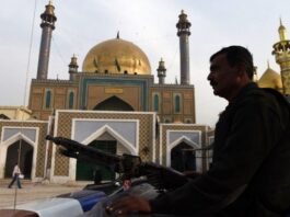Sehwan police officers were suspended for letting people into the shrine Sehwan police officers were suspended for letting people into the shrine